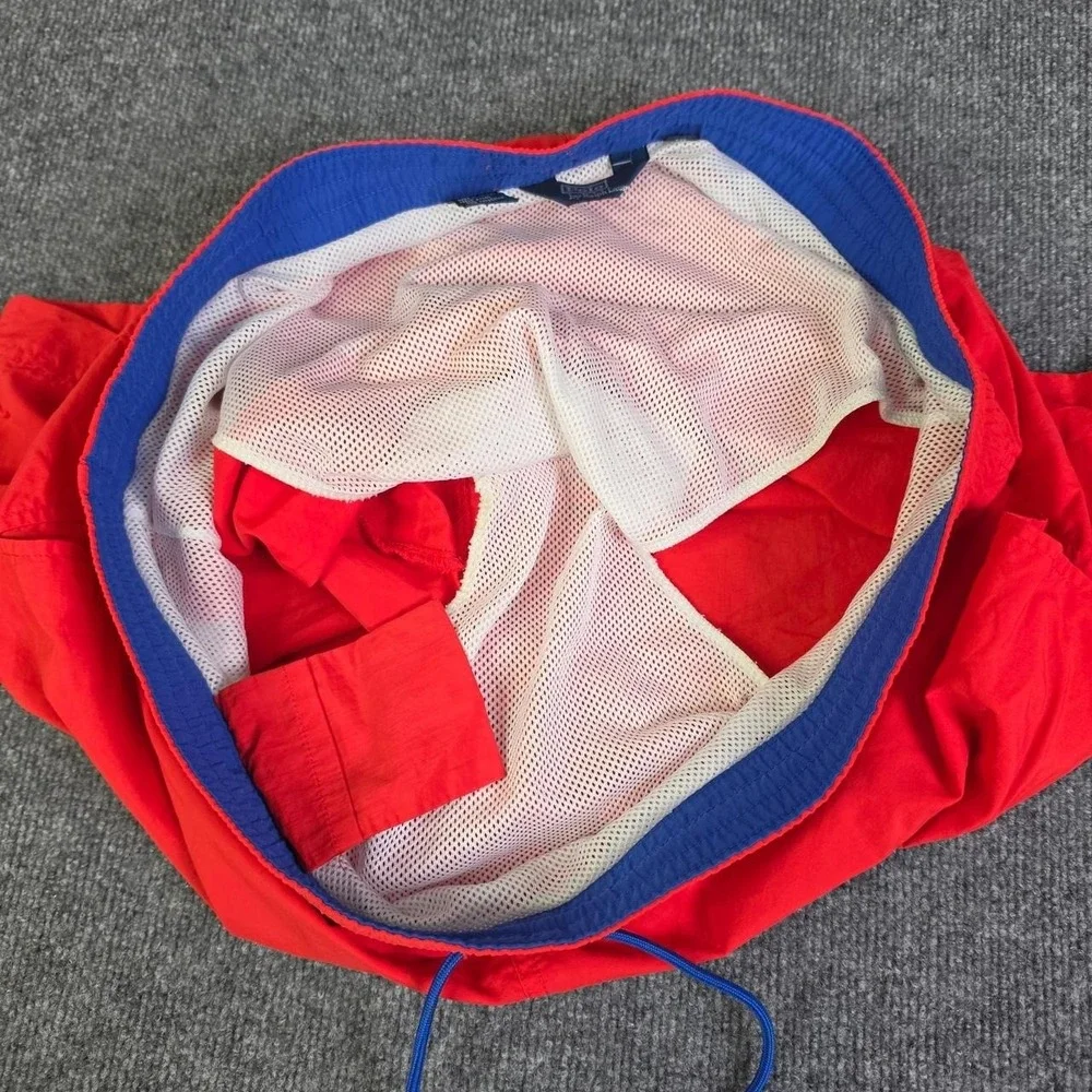 Polo Ralph Lauren orange swim shorts with blue drawstrings. Size XL.